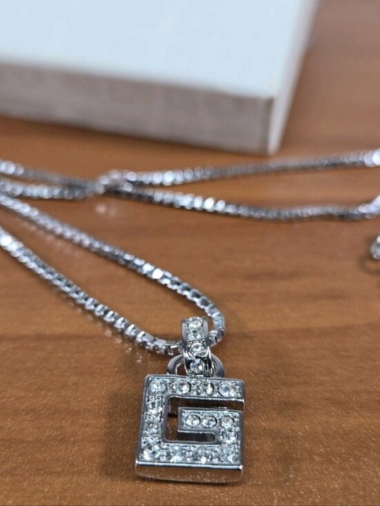 Givenchy Jewelry - Givenchy G Logo Crystal Square Pendant Silver Tone Necklace/ Never Worn